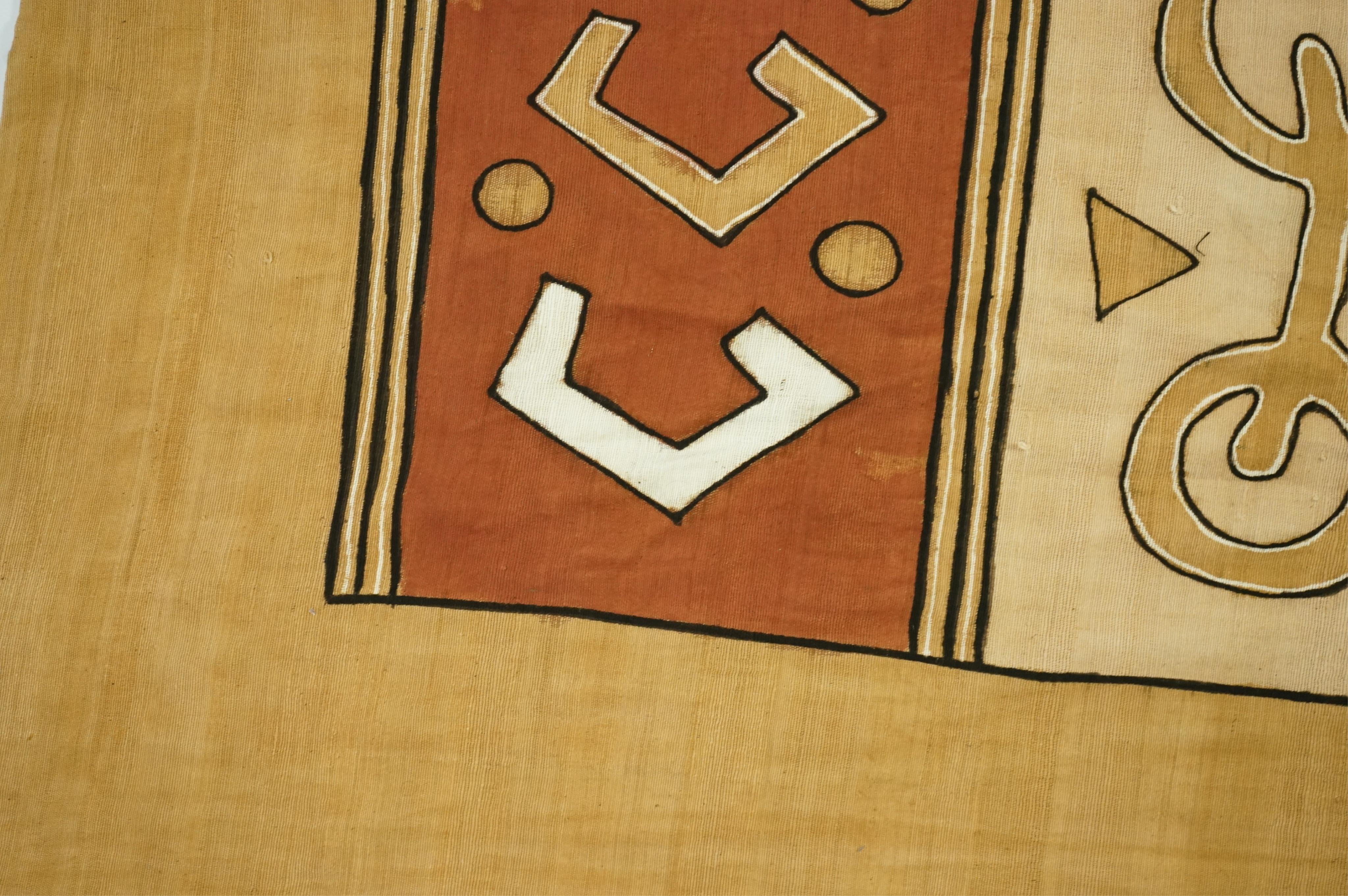 A collection of five 20th century African Congo hand woven and embroidered raffia palm leaf runners and mats, together with a later large printed hanging. 260cm x 138cm. Condition - one smaller mat has a hole in the weav